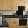 Photo 5: Kitchen with white goods provided