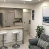 Photo 8: Modern Kitchen with Breakfast Bar