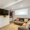 Photo 7: Plush seating area with Virgin TV