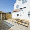 Photo 7: Courtyard garden with BBQ & bike racks