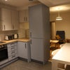 Photo 2: The Kitchen looking into the living room