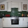 Photo 2: Granite worktops. Wooden floors.