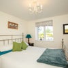 Photo 2: Light and airy bedroom - all linen provided