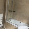 Photo 9: Powershower over the bath