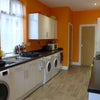 Photo 5: Fully equipped kitchen with 2 x washing machines & dryer