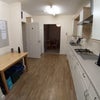 Photo 4: Kitchen through to dining room