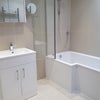 Photo 2: Bath and Power Shower
