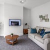 Photo 7: Now with large corner sofa,