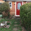Photo 4: Front of house with parking