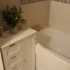 Photo 5: Over bath shower shared bathroom