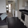 Photo 4: Kitchen and landing leading to back of the flat