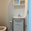 Photo 5: Toilet downstairs 