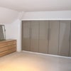 Photo 2: Built in wardroom + dressers