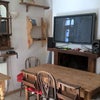 Photo 5: The Shared TV & Dining Room
