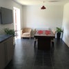 Photo 2: Dinning & sitting area