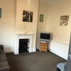 Photo 4: The comunal Open plan kitchen/lounge area