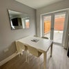 Photo 3: Dining area with double doors leading to large garden