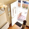Photo 5: The hallway view down the stairs to the front door. A lovely home.