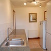 Photo 7: The shared utility room