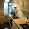 Photo 3: Kitchen with washer and dryer