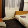 Photo 5: Bed along wall