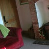 Photo 5: lounge and central wood burner