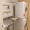 Photo 4: Mini kitchen. Fridge, microwave, kettle, toaster, washing machine and dryer.