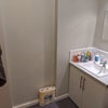 Photo 6: The sink in the shared hallway with 1 other tenant