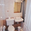 Photo 5: Bathroom with bath and shower