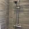 Photo 4: Shower down stairs