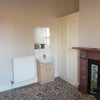 Photo 2: Bedroom showing sink
