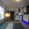 Photo 6: Living area