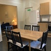Photo 1: Large kitchen looking towards lounge