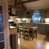 Photo 8: Shared kitchen with large double cooker, separate fridge in utility room
