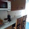 Photo 9: Breakfast bar to sit at if wanted.