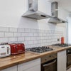Photo 4: 2 ovens with hobs