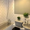 Photo 3: Bathroom with washing machine