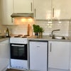 Photo 7: Kitchen with meg fridge & cooker