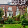 Photo 2: Back property from garden