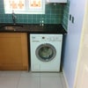 Photo 5: Utility room with small bathroom
