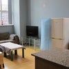 Photo 8: Living room (shared) *tv is now wall mounted to allow for more space in the area