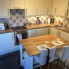 Photo 5: Kitchen and breakfast bar