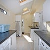 Photo 5: Huge Utility Room with Washin Machine Dryer Extra Fridges and Cupboards