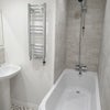 Photo 2: Bathroom adjacent to front bedroom