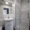 Photo 5: 1 of the shared bathrooms