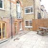 Photo 9: Private courtyard (shared garden adjacent)