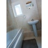 Photo 4: Clean bathroom with separate toilet