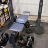 Photo 4: As well as the bench press, there is a pull up bar and TRX ropes.