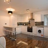 Photo 2: Open plan kitchen and dining