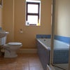 Photo 2: main bathroom/shower